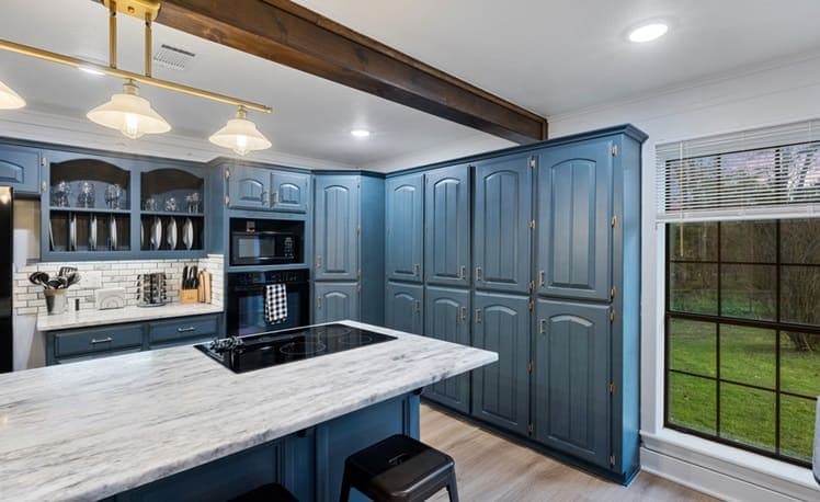 Kitchen with island and bar stools