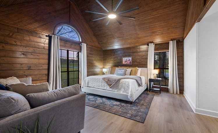 Primary bedroom with king bed and ensuite bath